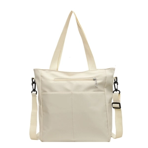 Sac fourre-tout imperméable crème en nylon avec bandoulière et poche zippée devant