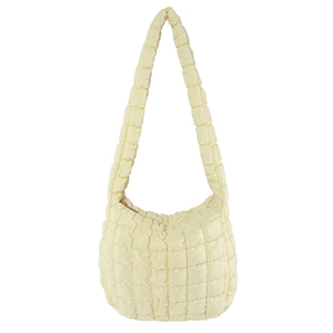 Minimalist light yellow quilted puffer shoulder bag with a padded strap and gold zipper
