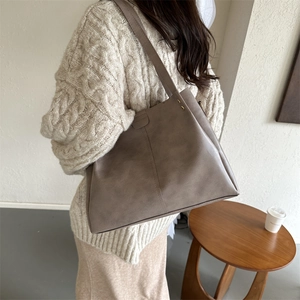 Minimalist taupe tote bag for women showing a stylish large capacity shoulder bag design