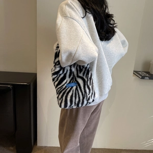 Plush zebra pattern handbag for women, stylish minimalist faux fur shoulder bag for winter