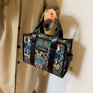 Chic multi-color python print PU leather tote bag with black handles and shoulder strap