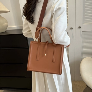 Brown faux leather rectangle tote bag with woven strap and tie detail for women