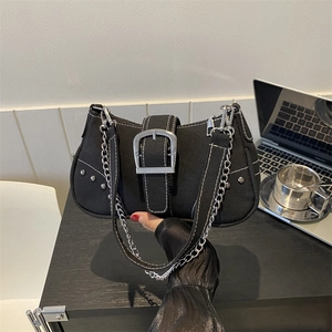 Retro black canvas shoulder bag with white stitching and silver chain detail