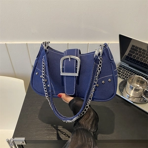 Navy canvas shoulder bag with white contrast stitching and silver square buckle decor