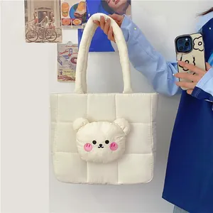 Quilted nylon puffer tote bag with cute plush bear head decoration in cream white