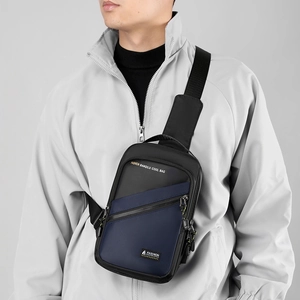 Detail of multi-functional chest bag in water-repellent nylon with zip pocket