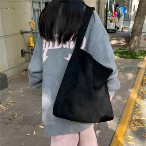 Retro black suede oversized tote bag with moon shape and integrated wide shoulder strap