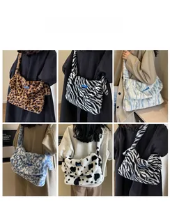 Detail shot of plush crossbody bags showing various faux fur animal patterns and textures