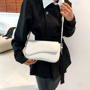 Minimalist white PU shoulder bag with unique wavy asymmetric flap design for women