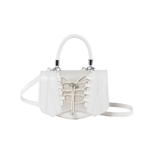 White minimalist patent leather handbag with drawstring detail and round top handle