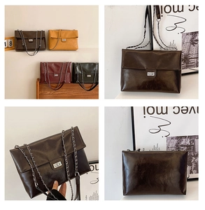 Detail of vintage PU leather flap bag with silver rotating lock and chain strap