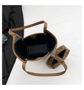 Overhead view of a premium brown PU leather tote bag set with matching zipper clutch pouch