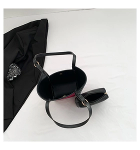 Top view of two-tone PU tote bag set with metal magnetic closure and small matching pouch