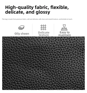 Detailed macro view of black lychee grain synthetic leather with glossy polished finish