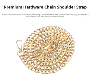 Detailed view of polished gold metal chain strap with secure lobster clasp for handbags