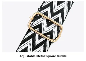 Close-up of adjustable gold buckle on black and white woven herringbone camera bag strap