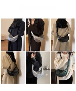 Quilted crescent crossbody bags in silver, black and green shown on a model