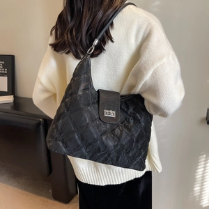 Classic black quilted hobo shoulder bag for women with elegant silver metal twist lock