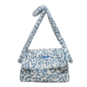Winter plush shoulder bag with blue and white leopard print and wide shoulder strap