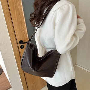 Minimalist dark brown half-moon PU leather crossbody bag with pleated base design