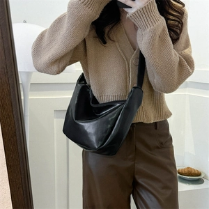 Minimalist black PU leather hobo shoulder bag with wide strap for winter style