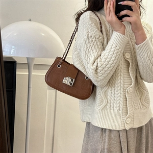 Brown crocodile embossed faux leather shoulder bag with silver cross clasp and chain strap