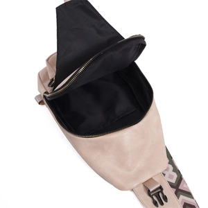 Macro detail of the spacious main compartment with black fabric lining and durable zipper