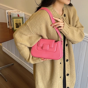Chic pink PU leather shoulder bag with a sleek minimalist design and wide strap