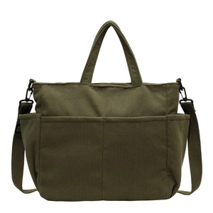 Dark green corduroy crossbody bag with multiple pockets and adjustable shoulder strap