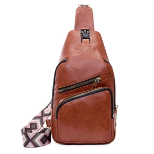 Brown PU leather crossbody bag with multiple zippers and geometric pattern wide strap