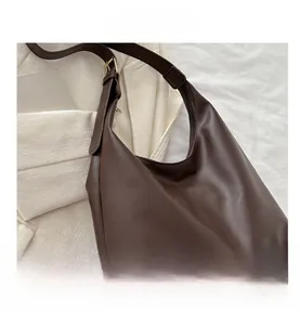 Close-up of the dark brown PU leather hobo bag with adjustable strap and gold buckle
