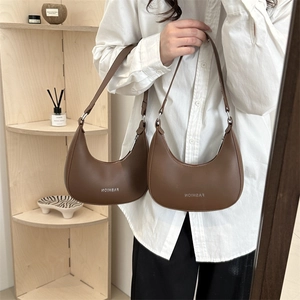 Brown matte leather half-moon hobo bag with Fashion print and adjustable strap