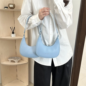 Chic light blue faux leather hobo bag with fashion letter print for women
