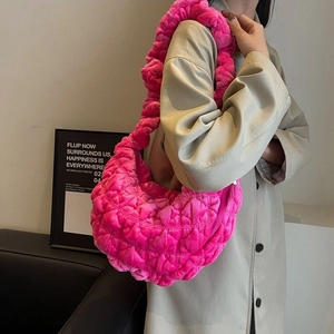 Hot pink plush quilted cloud bag with scrunchie strap for dopamine winter styling