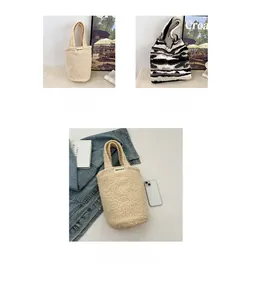 Detail view of plush teddy fabric handbags in cream white and zebra print patterns