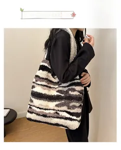 Close-up of zebra pattern plush tote bag showing soft faux fur texture for winter