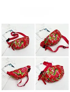 Detail view of red nylon crossbody bag with traditional Chinese floral peony patterns