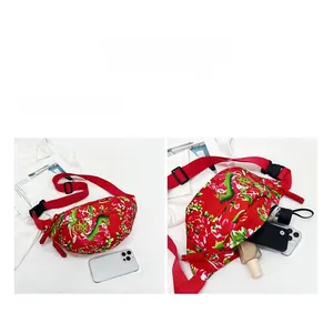 Detail view of red nylon crossbody bag showing large capacity for umbrella and phone
