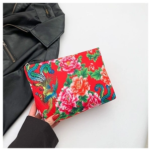 Chic red nylon clutch bag featuring traditional phoenix and peony floral embroidery designs