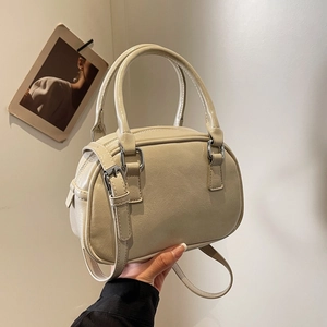 Minimalist beige PU leather Boston handbag with round top handles and adjustable strap