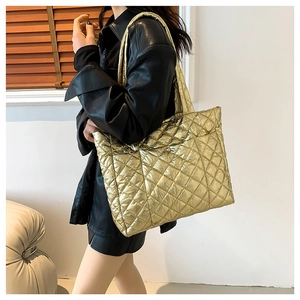 Chic gold quilted tote bag in metallic PU leather for women with spacious design