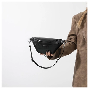 Modern black PU leather chest bag with adjustable nylon strap and metal ring detail