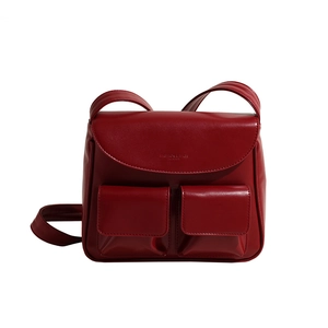 Fashionable deep red PU leather shoulder bag with front pockets and elegant matte finish