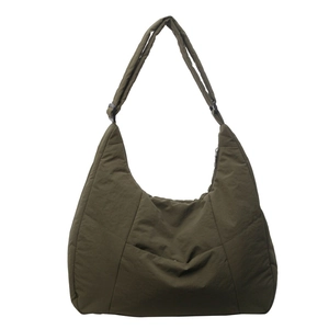 Quilted olive nylon crescent tote bag with wide strap and zip for daily commuting
