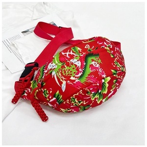 Winter nylon crossbody bag with traditional red floral pattern and braided tassel zipper