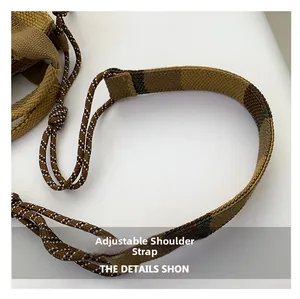 Detail of adjustable woven shoulder strap with stylish patterned drawstring on canvas bag