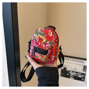Mini red floral canvas crossbody bag with traditional Chinese flower print and black strap