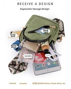 Detailed interior storage view of the green crossbody bag with ethnic strap and daily items