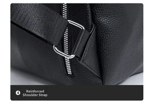 Detail of reinforced shoulder strap design and silver metal buckle on black leather bag