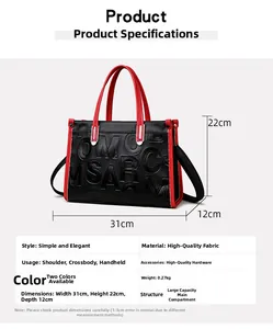 Détails montrant les dimensions 31x22x12cm sur un sac à main chic noir et rouge